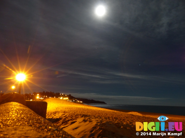 FZ010568 Moon as bright as streetlamp at Exmouth beach